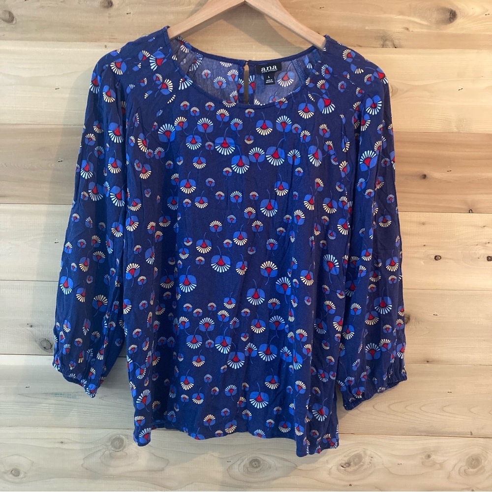 Ana blue floral patterned blouse
